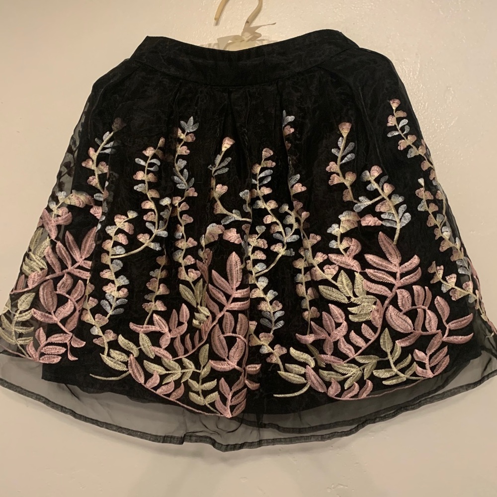 Black floral mini skirt.  Embroiled flower stems!